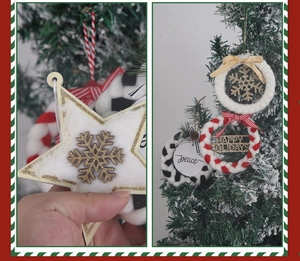 Detail of wooden star and woven holiday wreaths with festive bows and Merry Christmas tags