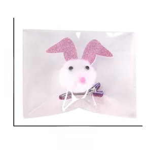 Detailed size view of plush bunny ears hair clip with 5-inch width measurements