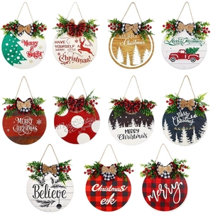 Set of 11 round wooden Christmas door signs with pine needles and festive ribbons