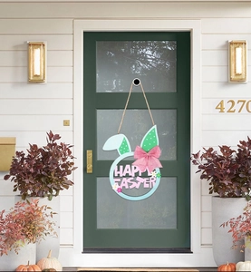 Easter rabbit door sign in light blue with pink Happy Easter text and a woven bow