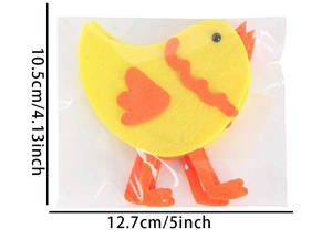 Flat yellow felt chick decoration with orange accents in packaging, 5 inch width