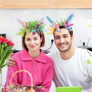 Detail showing white plush bunny ears headband with sequins and colorful festive tinsel