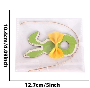 Detailed view of green wooden Easter bunny ornament with yellow bow and dimensions