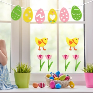 Easter felt decoration set with colorful eggs, chicks and tulips for holiday window display