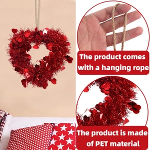 Close-up of red heart foil wreath with glitter texture and rustic hanging rope