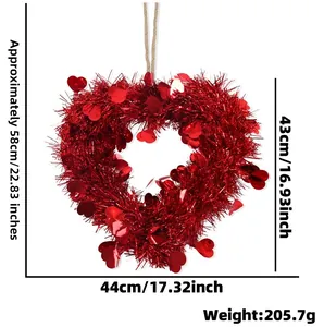 Red laser tinsel heart wreath decoration with shiny sequins for Valentine party layout
