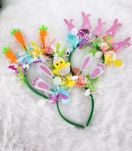 Easter headbands featuring glitter bunnies and chicks on soft white plush background