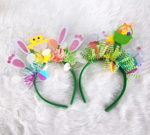 Detail of Easter headbands featuring yellow chicks, bunny ears and colorful egg baskets