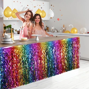 Vibrant rainbow metallic foil fringe table skirt for colorful party decorations