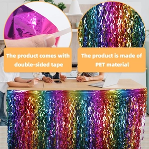 Detail of colorful rainbow PET foil fringe table skirt with adhesive tape for parties