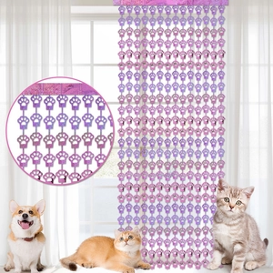 Pink and purple paw print foil fringe curtain for pet birthday party decorations