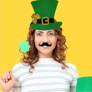 St. Patrick's Day party kit featuring a green top hat, fake beard, and clover photo prop