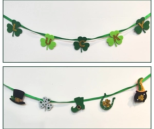 Détail de la bannière LUCKY trèfle vert pour la St-Patrick avec des lettres pailletées