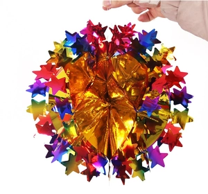 Detail of colorful laser star honeycomb decoration with metallic foil hanging ornament