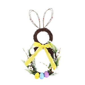 Ghirlanda di Pasqua a forma di coniglio con uova colorate, fiocco giallo e fiori
