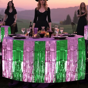 Pink and green metallic tinsel table skirt for Wicked witch themed party decorations