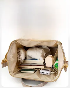 Top view of large capacity diaper bag with scientific partitioning for organized storage