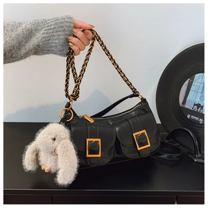 Minimalist black PU dumpling bag with gold chain strap and cute rabbit pendant charm