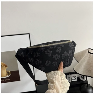 Black floral embroidered saddle bag with 3D texture and gold zipper for women