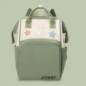 Waterproof multi-functional diaper backpack in green and beige color-block with stars