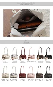 Detail view of double front pockets and internal compartments of a leather tote bag