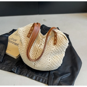 Minimalist hand-woven cotton tote bag with brown straps for summer beach vacations