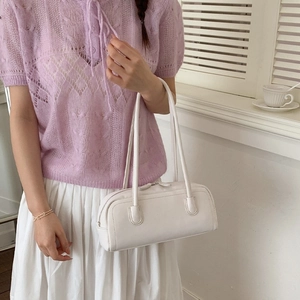 Minimalist white leather bowling handbag for women with double shoulder straps in casual style