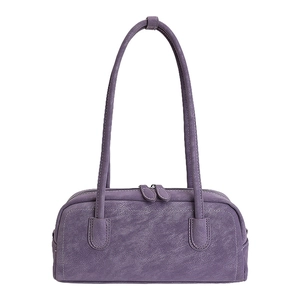 Minimalist purple faux leather bowling handbag with slim shoulder straps and dual zippers