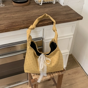 Ginger yellow canvas tote bag with red polka dots and lace bow detail for casual fashion