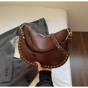 Vintage dark brown half-moon hobo bag with gold studs and adjustable shoulder strap