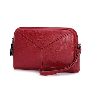 Elegant red leather phone purse with litchi grain texture and black decorative stitching