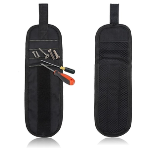 Detail of magnetic wristband with screws and mesh backing for tool organization