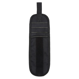 Detail view of durable black tool wristband with strong stitching and velcro strap