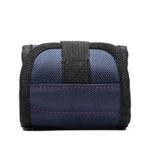 Detailed view of the blue nylon magnetic wristband with durable black reinforced edges