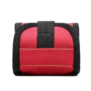 Close-up of durable red and black Oxford cloth tool wristband with reinforced stitching