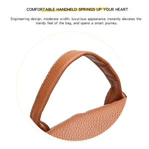 Detail view of ergonomic brown PU leather handle with reinforced stitching and lychee texture