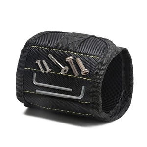 Strong magnetic tool wristband in black nylon for holding screws and metal parts