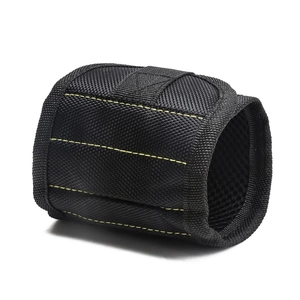 Close-up of magnetic tool wristband with breathable mesh lining and yellow stitching