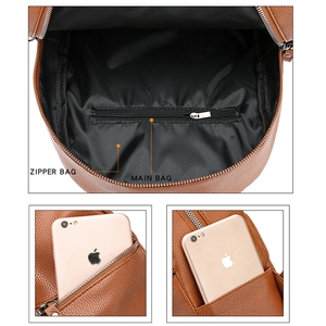Detailed view of brown PU leather backpack interior compartments and side pocket capacity