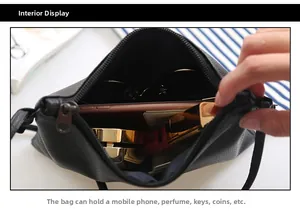 Top view of the black lychee pattern crossbody bag showing internal storage capacity