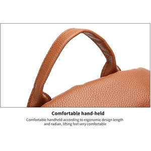 Ergonomic brown washed PU leather handle with reinforced stitching and lychee texture
