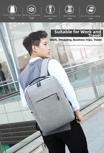Detailed back view of a grey slim business laptop backpack fitting 14 and 16 inch devices