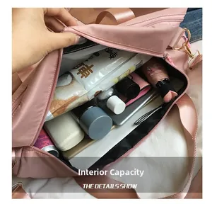 Macro shot of large capacity pink Oxford cloth travel bag with organized inner compartments