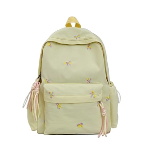Cute cream-colored backpack with colorful bow embroidery and drawstring side pockets