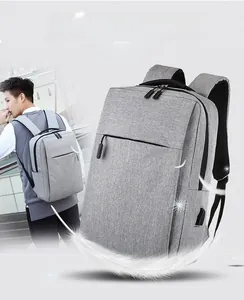 Detail of grey business backpack with built-in USB port and breathable honeycomb padding