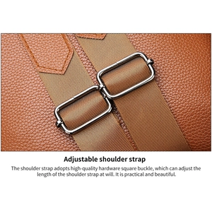 Detail of adjustable beige woven strap and gunmetal buckle on brown PU leather backpack