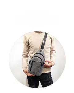 Detailed view of gray checkered chest bag with adjustable strap and front zipper pocket