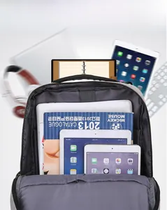 Detail view of large capacity gray backpack interior storing laptops and tablets