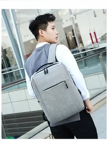 Detail of grey textured fabric on minimalist business backpack with hidden front zipper