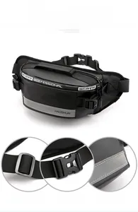 Detail view of water-resistant black waist bag with reflective strip and adjustable buckle